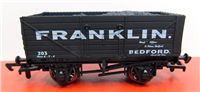 57011