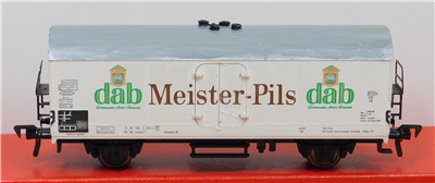 57058b